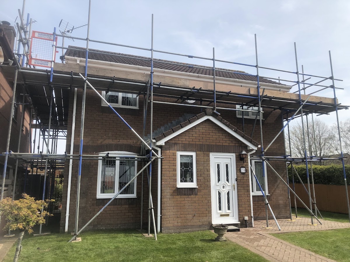 Detached house, wrapped for roof and fascia work
