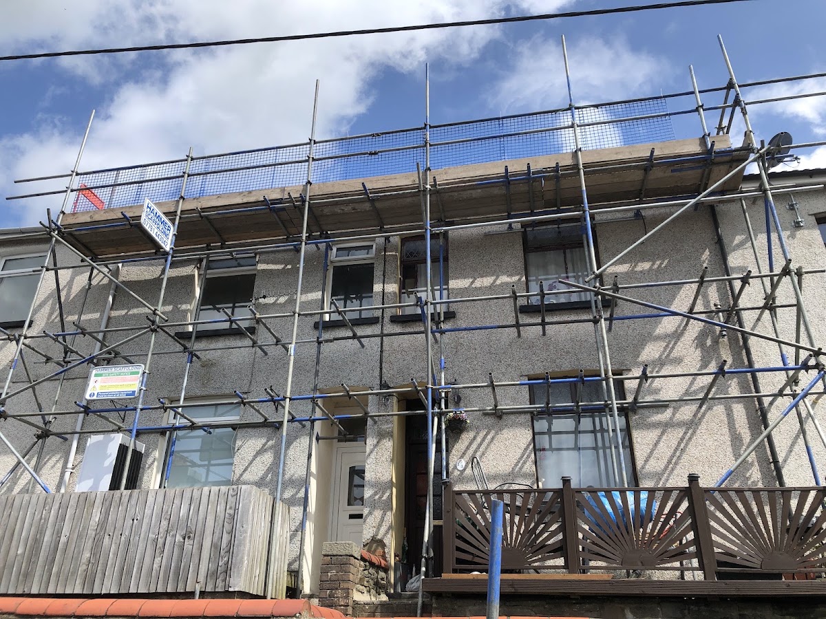 Terraced pair, single lift across both frontages